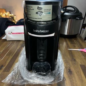 Brand new baby brezza pro wifi. Asking 180 paid 318$ for it